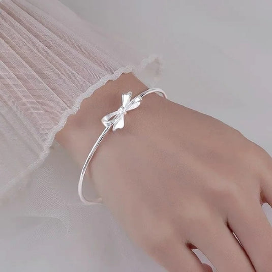 White Gold Plated Cuff Bangle in a Pretty Bow Design