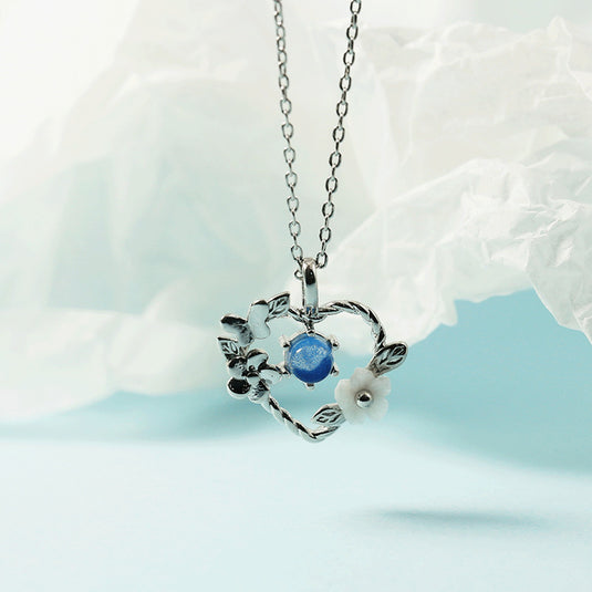 Heart Pendant with Butterfly & Flower Charms with a Chain