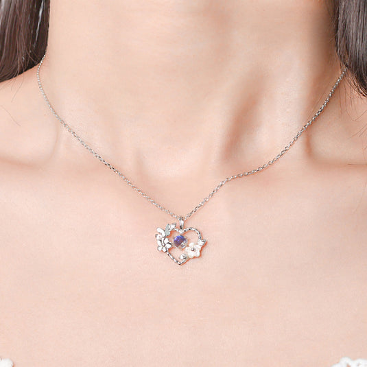 Heart Pendant with Butterfly & Flower Charms with a Chain