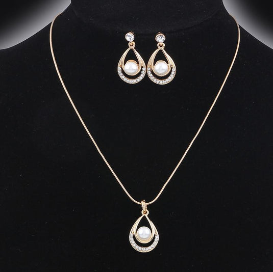 Beautiful Crystal Studded Pearl Pendant Necklace with Earrings Set