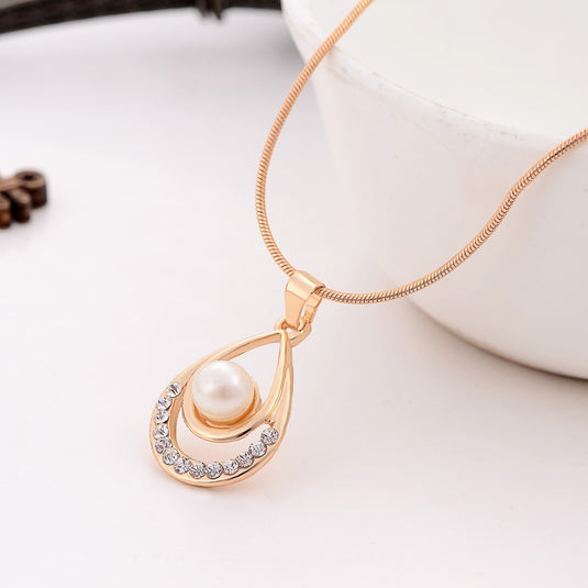 Beautiful Crystal Studded Pearl Pendant Necklace with Earrings Set