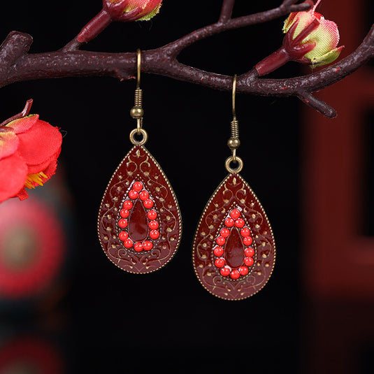 Classic Indo Western drop earrings with an ethnic look in Shades of Red