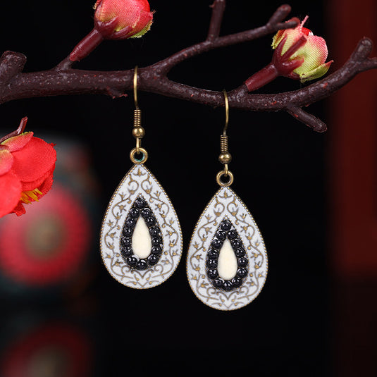 Classic Indo Western drop earrings with an ethnic look in Shades of White