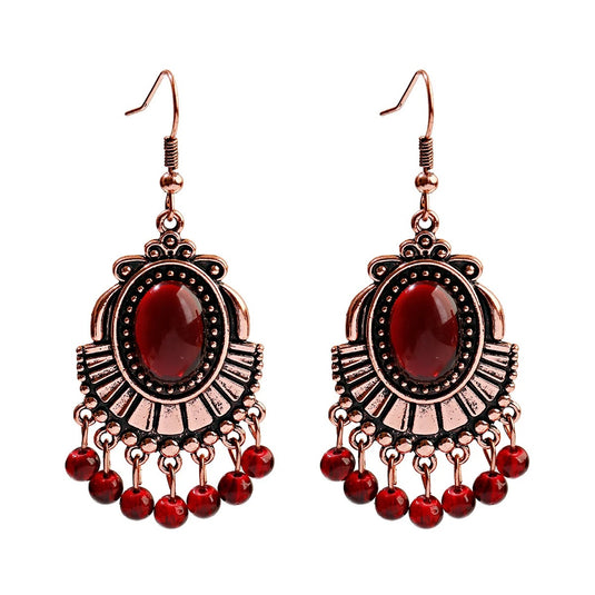 Classic Indo Western drop earrings with an ethnic look in Rose Gold