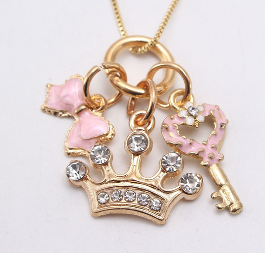 Crystal studded Tiara Pendant with delicate Key & Bow Multiple Charm Pendant