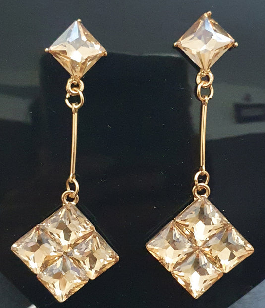 Multi colored stones outlined in Gold classic wear danglers 6 classic colors to add grace to any of your classic outfits