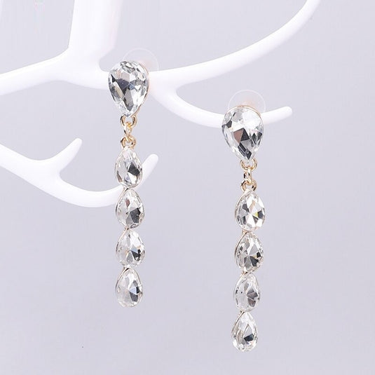 White Zircon stones outlined in Gold classic wear danglers