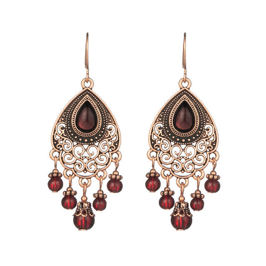 Classic Indo Western drop earrings with an ethnic look in Rose Gold