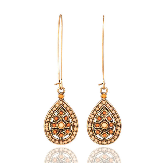 Classic Indo Western drop earrings with an ethnic look in Peach & Cream