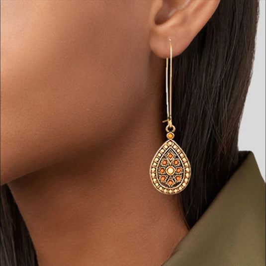 Classic Indo Western drop earrings with an ethnic look in Peach & Cream