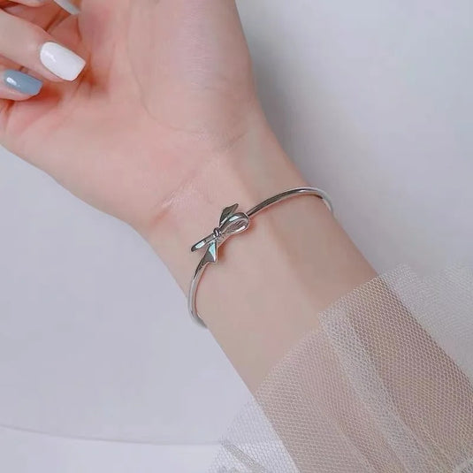 White Gold Plated Cuff Bangle in a Pretty Bow Design