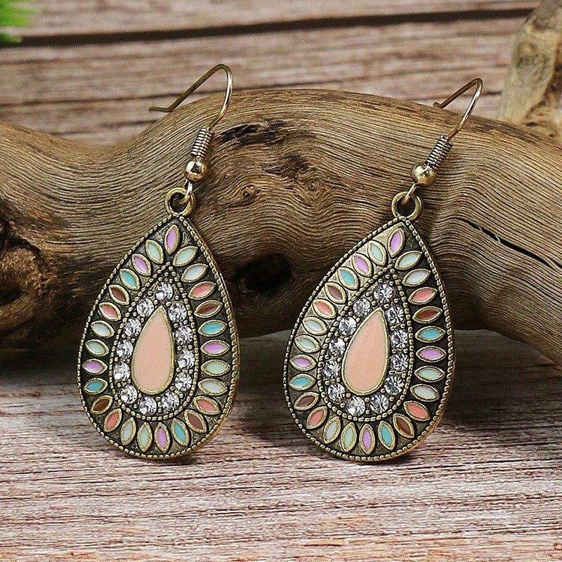 Classic Indo Western drop earrings with an ethnic look in Shades of Peach & Cream