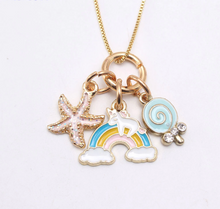 Load image into Gallery viewer, Tiny Unicorn Pendant on a beautiful Rainbow with a Starfish &amp; Ice Cream Multiple Charm Pendant